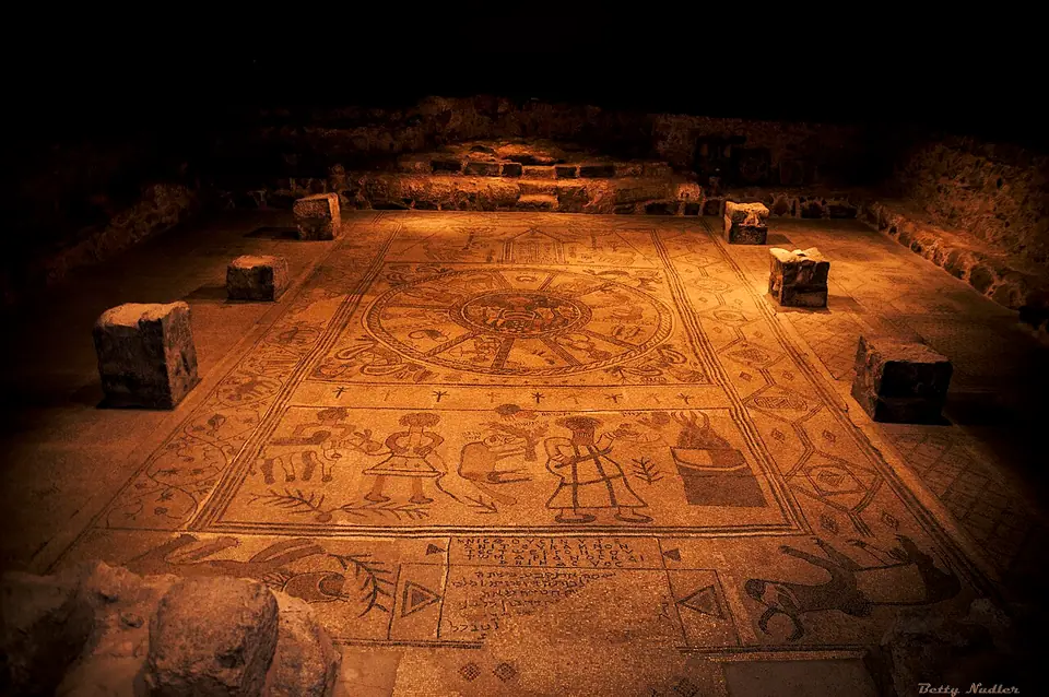 The sixth-century mosaic floor of the Beit Alfa synagogue: a zodiac wheel with the sun god's chariot at the centre and the four seasons in the corners