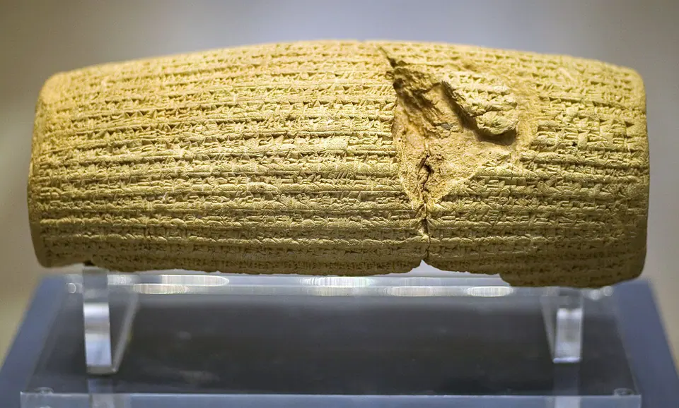 The barrel-shaped clay Cyrus Cylinder, inscribed in Babylonian cuneiform, in the British Museum