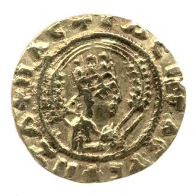 A gold Aksumite coin of King Ezana showing a crowned bust within a Greek legend
