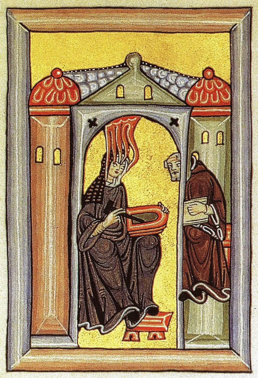 Medieval illumination of Hildegard of Bingen seated under an arch receiving a vision as flames descend on her head, writing on a tablet, with her secretary Volmar beside her