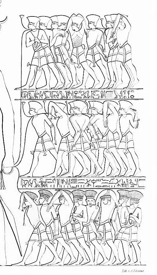 Relief of bound prisoners wearing feathered headdresses, identified as Peleset (Philistines), from the temple of Ramesses III at Medinet Habu