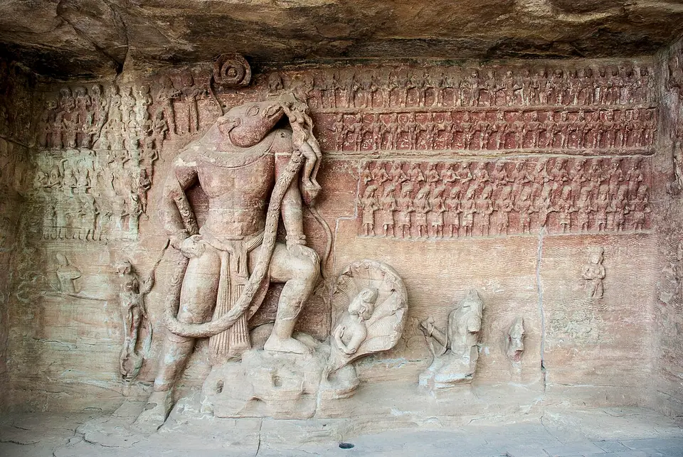 Rock-cut relief at Udayagiri of boar-headed Varaha lifting the earth goddess, among rows of figures